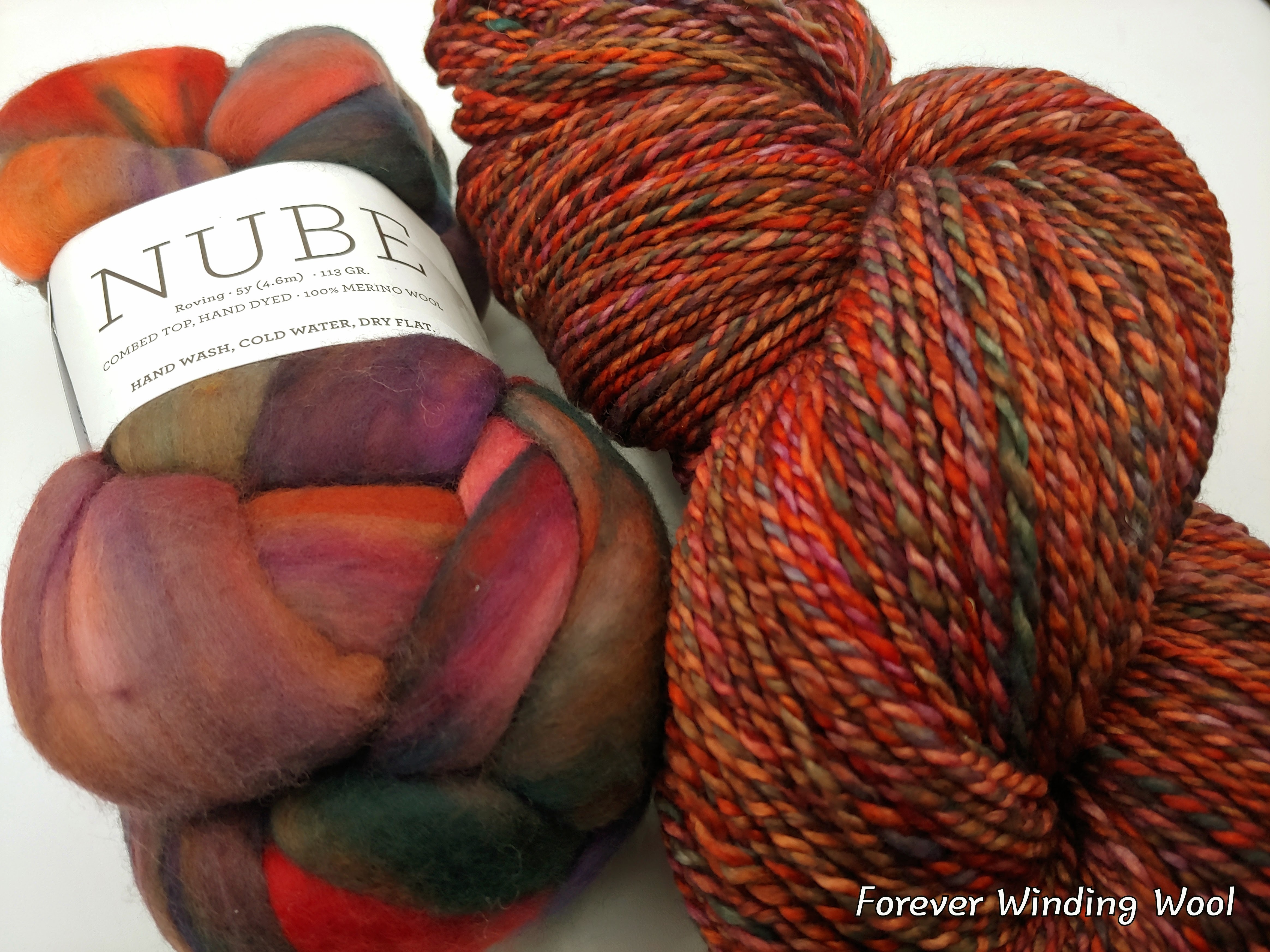 Nube roving and the resulting handspun yarn. Nube roving in Marte (121) colorway and the resulting handspun yarn for illustration.